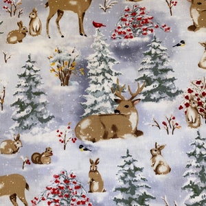 May include: A winter-themed fabric featuring deer, rabbits, birds, and snow-covered trees. The design includes brown deer with antlers, small birds, and fluffy rabbits amidst snowy fir trees and red berry bushes. The background is a light blue.