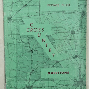 May include: A green map with the words "Private Pilot Cross Country Questions" printed in red. The map shows the state of Ohio with cities and towns marked. The map is divided into sections with different colors and lines.