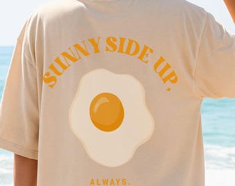 Sunny Side Up Grafik T-Shirt: Retro Foodie T-Shirt, Positive Vibes, lustiges Ei, Immer positiv bleiben, Happy Vibe Streetwear, psychische Gesundheit