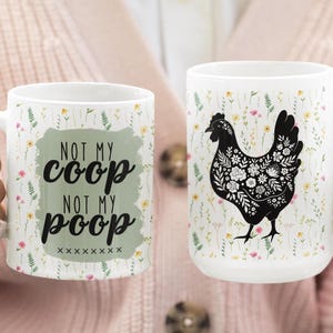 May include: Two white ceramic mugs. One mug has the text "NOT MY COOP NOT MY POOP" on a green background. The other mug features a black chicken silhouette filled with floral patterns. Both mugs have a floral background.