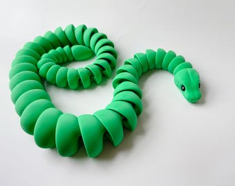 Juguete de serpiente verde