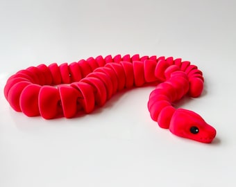 Juguete de serpiente roja