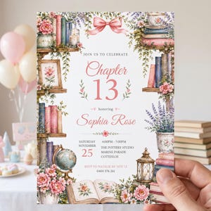 May include: A rectangular invitation card featuring a watercolor illustration of bookshelves filled with books, flowers, a globe, a lantern, and a teacup. The text reads: JOIN US TO CELEBRATE Chapter 13 honoring Sophia Rose SATURDAY NOVEMBER 25 4:00PM - 7:00PM THE POTTERY STUDIO MARINE PARADE COTTESLOE RSVP TO NATALIE BY NOV 12 0400 376 261.
