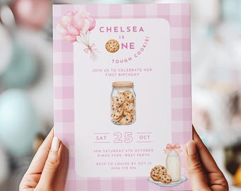 May include: Pink and white gingham patterned invitation with a cookie jar and balloons. The text reads "Chelsea is one tough cookie" and includes details for a first birthday party.