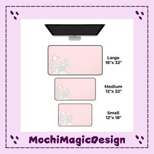 May include: Three rectangular desk mats in light pink with a black line art illustration of trees and a moon in the bottom left corner. The sizes are labeled as Large 16" x 32", Medium 12" x 22", and Small 12" x 18". The text MochiMagicDesign is at the bottom.