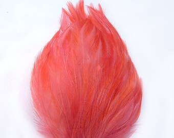 CORAL ORANGE Feather Pad (rooster feather) Applique for millinery,mardi gras masks,costume hats,flapper feather fascinator,children headband