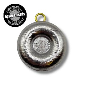 May include: A silver-colored fishing weight with a gold loop at the top. The weight is shaped like a disc with a raised center. The weight is labeled "4" on the side.