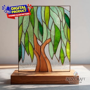 May include: Stained glass panel featuring a tree design with green and blue leaves, a brown trunk, and a wooden base. The panel is labeled "DIGITAL PRODUCT STAINED GLASS PATTERN".