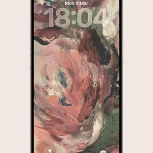 May include: A smartphone displays a digital abstract painting in shades of pink, brown, and green. The lock screen shows the time 18:04 and the date Mon 9 Mar. The phone has a silver frame and a light beige background.