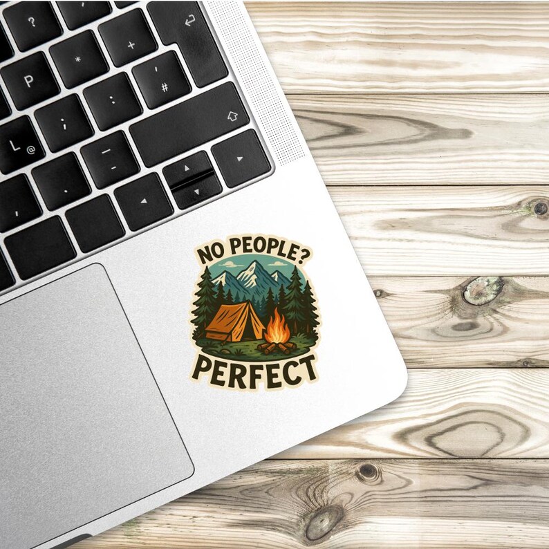 May include: A sticker with a vintage illustration of a campsite with a tent, campfire, and mountains. The text reads "No People? Perfect."