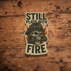 Still Plays With Fire Sticker – Firefighter Skull Helmet Vinyl Decal – Grunge Fire Dept Die Cut Sticker – Hose Nozzle Flame Art