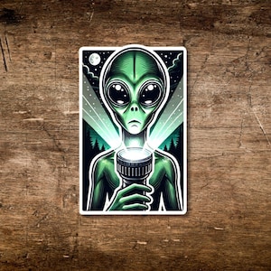 Alien Flashlight Sticker Funny UFO Vinyl Decal Forest Night Sky Cryptid Crossover Design