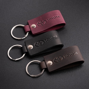 Llavero de cuero apto para Toyota Crazy Horse de alta calidad.