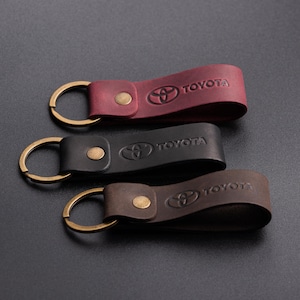 Llavero de cuero apto para Toyota Crazy Horse de alta calidad.