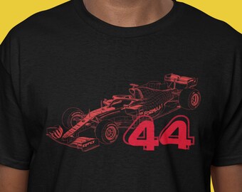 May include: Black t-shirt featuring a red outline of a Formula 1 race car and the number 44. The word "FORMULA" is visible on the car. The shirt is a crew neck style.