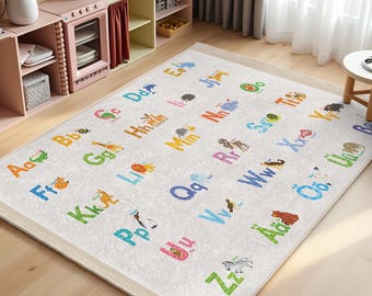 May include: A white alphabet rug with colorful letters and animal illustrations. The letters are in a playful font and the animals are cartoonish. The rug is perfect for a child's playroom or bedroom.