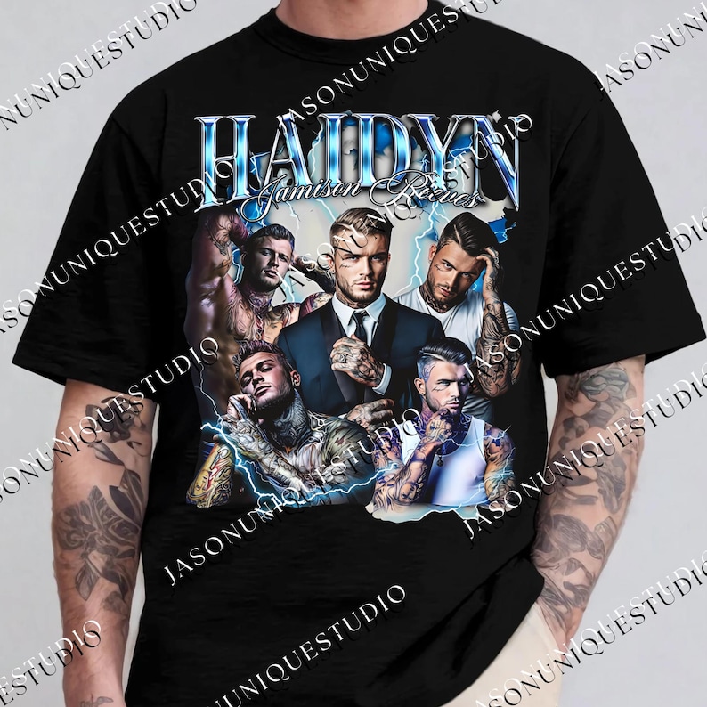 a man wearing a black t - shirt with a picture of the characters of the