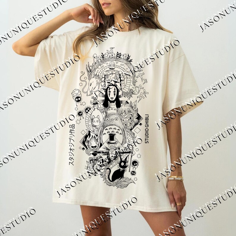 a woman wearing a white t - shirt with a drawing on it
