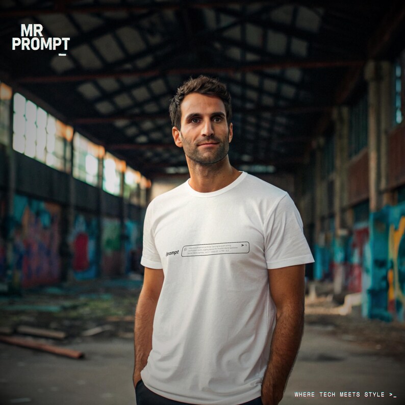 May include: A white t-shirt featuring the word "prompt" and a search bar design. The person is in an industrial setting with graffiti art. The text "WHERE TECH MEETS STYLE >_" is at the bottom of the image.