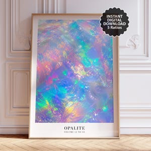May include: A rectangular framed wall art print featuring an abstract iridescent pattern with vibrant swirls of blue, purple, pink, and green. The bottom of the print displays the text OPALITE VOLUME 12 NO 03. A black circular badge reads INSTANT DIGITAL DOWNLOAD 5 RATIOS.