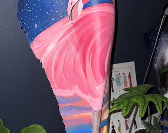 Felicia Painted flamingo on palm frond