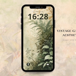 以下が含まれることがあります： ベージュの背景に緑のシダとその他の葉が描かれた、ヴィンテージスタイルの携帯電話の壁紙。時間は16:28で、日付は7月26日土曜日です。また、「Vintage Garden Aesthetic」と「Starry Soul Design」のテキストも表示されています。