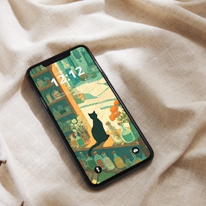 May include: A black smartphone displays a whimsical illustration of a black cat perched on a shelf, overlooking a scene with bottles and flowers. The time 12:12 is visible on the screen. The phone rests on a beige, textured surface.