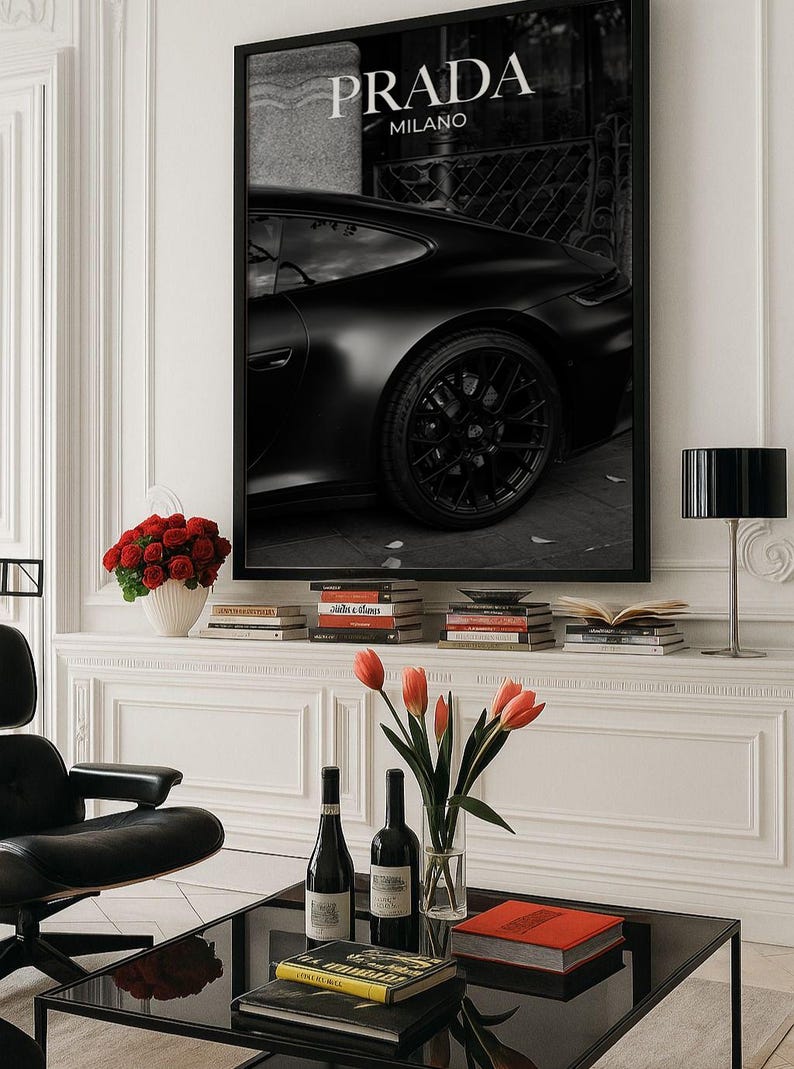 Old money fashion style black-and-white Porsche artwork with Prada-inspired text, creating a moody luxury aesthetic. This elegant print is ideal for old money prints, old money aesthetic décor, and upscale fashion poster displays. Perfect for lovers of luxury prints, luxury car poster décor, and designer interiors seeking prada fashion inspired poster styling and dark elegance minimalist fashion home decor accents.
