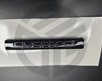 Naklejka na grill bagażnika Audi Quattro (7,2 cm) w kolorze błyszczącej czerni A3 A4 A5 A6 A7 Q2 Q3 Q4 Q5 Q7 2000-2015