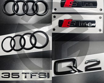 Audi Q2 2017+ Czarne błyszczące emblematy na kratkę/bagażnik/błotnik, komplet 2 x S-Line/35TFSI