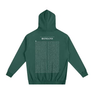 May include: A dark green hoodie with the text "THE LETTER OF PAUL TO THE ROMANS" and the word "ROMANS" printed in white. The back of the hoodie features a full-page print of text from Romans, chapter 8.