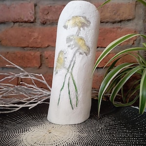 Handmade small lantern made of concrete and epoxy resin