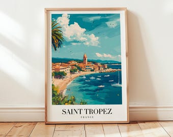 May include: A colorful illustration of Saint Tropez, France, featuring a seaside town with a church, palm trees, and boats in the water. The text "SAINT TROPEZ" and "FRANCE" is printed below the image.