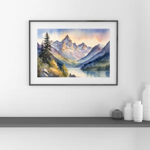 May include: Watercolor painting of a mountain range with a lake in the foreground. The mountains are a light purple and blue color, and the lake is a dark blue. The sky is a light blue with a pink and orange sunset.