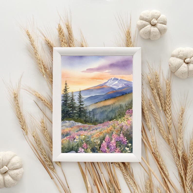 May include: A watercolor painting of a mountain landscape with a snow-capped peak, surrounded by lush green trees and wildflowers. The sky is a vibrant orange and purple, creating a beautiful sunset scene.
