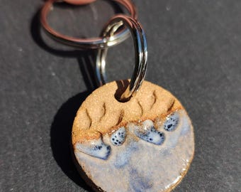 Keramische hondenpootsleutelhanger: handgemaakte Ocean Wave huisdierhalsbandbedel