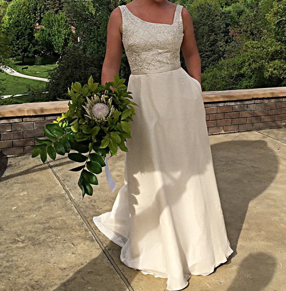 blush wedding dress with lace overlay