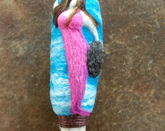 Wild woman drumming on this needle felted wool drum beater with a driftwood handle.