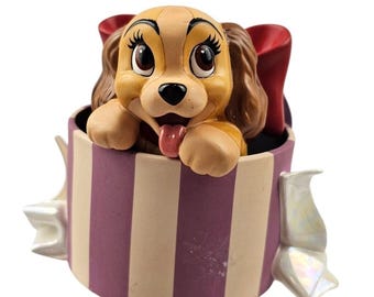 Estatua de la Bella Durmiente de Disney: La Dama y el Vagabundo (1999)