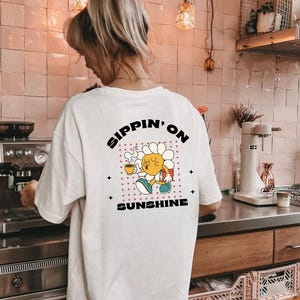 Sippin' On Sunshine Shirt- Retro Coffee T-Shirt, Cute Daisy Graphic Tee, Sunshine Club Aesthetic, Iced Coffee Lover Gift, Vintage Floral Top