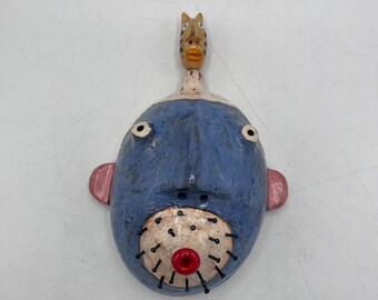 half head wall sculpture- blue person w/cat