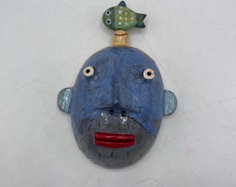 half head wall sculpture- blue person  w/ fish