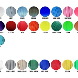 May include: A color chart featuring PLA and PETG colors. The PLA colors include black, white, grey, silver, bronze, deep blue, light blue, light pink, pink, light purple, purple, deep purple, deep red, red, orange, yellow, forest green, green, brown, light khaki, gold, and teal.