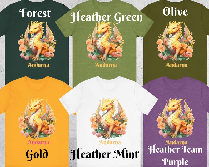 May include: A set of ten t-shirts featuring a yellow dragon with floral accents. The t-shirts are available in ten different colors: forest, olive, heather green, gold, heather mint, and heather team purple.
