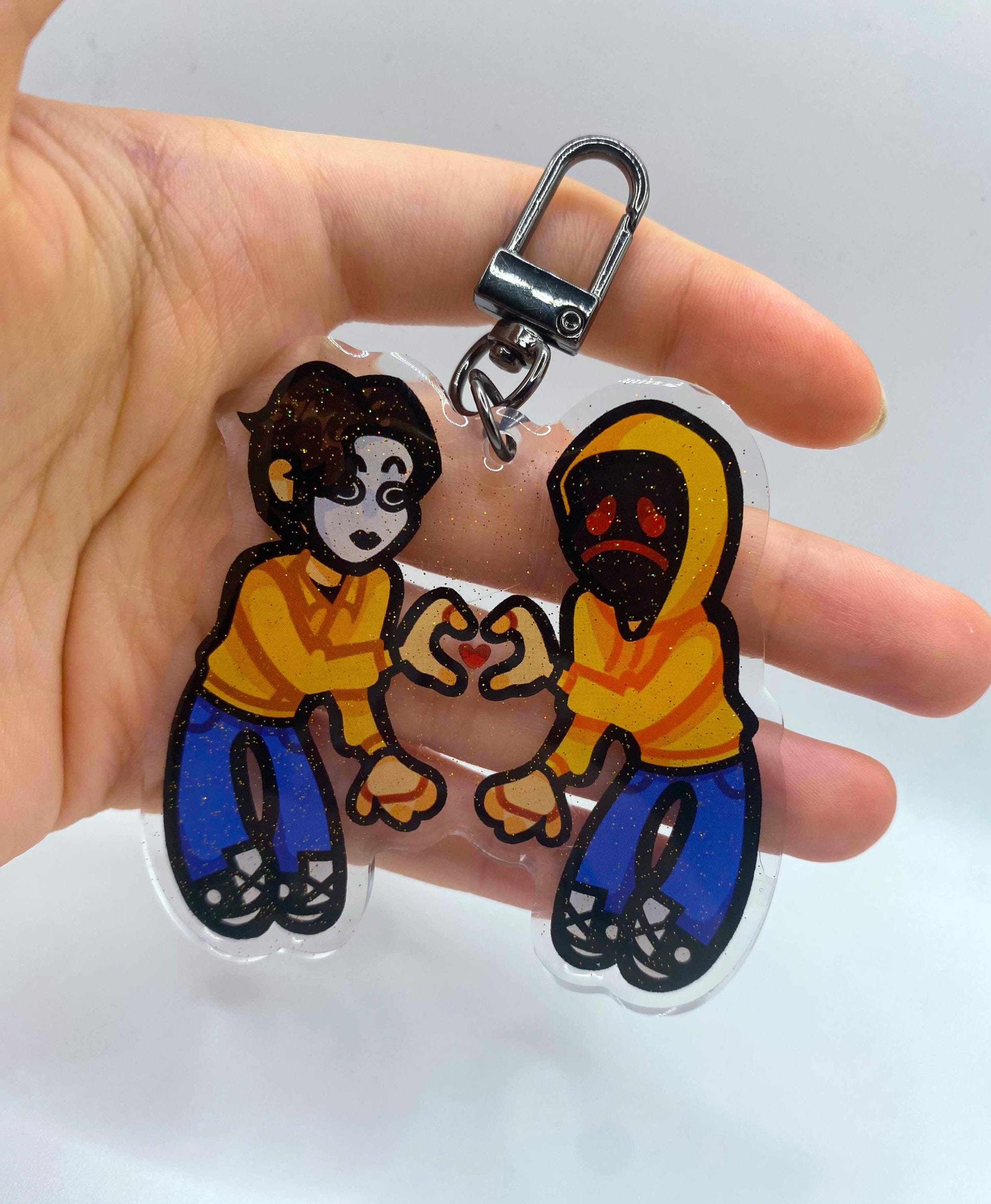 Hoodie And Masky Sparkle Acrylic Keychain