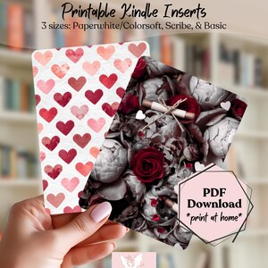 May include: Two printable Kindle inserts are held in a hand. One features a pattern of red and pink hearts on a white background. The other has a floral design with red roses and gray accents. Text reads "Printable Kindle Inserts" and "PDF Download *print at home*".