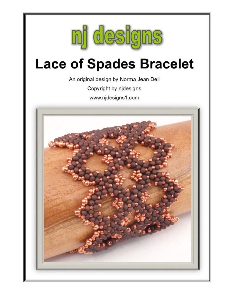 May include: A brown and copper beaded bracelet with a lace-like design. The bracelet is on a wooden surface. "nj designs" and "Lace of Spades Bracelet" are written above the bracelet.