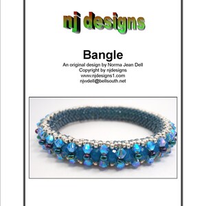 May include: A teal blue beaded bangle bracelet with iridescent blue and silver beads. The bracelet is made with a variety of beads, including round, faceted, and seed beads.