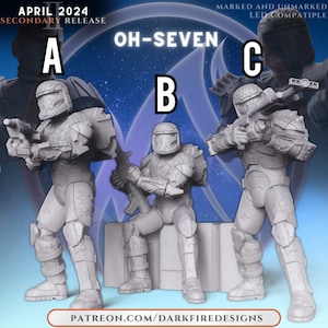 May include: Three gray plastic miniature figures of soldiers wearing futuristic armor and holding weapons. The figures are labeled A, B, and C. The text "OH-SEVEN" is visible in the image. The text "MARKED AND UNMARKED LED COMPATIBLE" is also visible in the image.