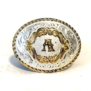 Hebilla de cinturón vintage con la letra "A" bañada en plata de Montana Silversmiths, con filigrana de plata y oro.